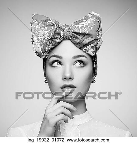 Portrait of beautiful young woman with bow. Brunette girl. Beauty fashion. Cosmetic make-up. Black and white View Large Photo Image Stock Image - Portrait of beautiful young woman with bow. Brunette girl. Beauty fashion. Cosmetic make-up. Black and white. Fotosearch
