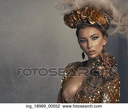 Stock Image - Portrait of the beautiful lady. Fotosearch