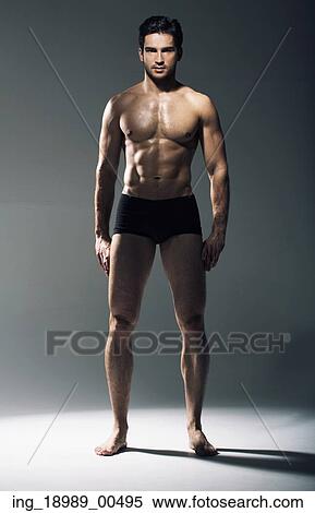 Stock Photography - Portrait of the muscular handsome man. Fotosearch