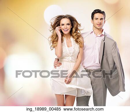 Stock Photography - Portrait of the walking adorable couple. Fotosearch