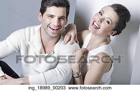 Portrait of young smiling couple View Large Photo Image Stock Image - Portrait of young smiling couple. Fotosearch