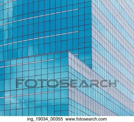 reflecting sky in glass of office building; geometric abstract background View Large Photo Image Stock Photography - reflecting sky in glass of office building; geometric abstract background . Fotosearch