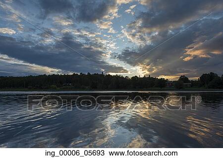 Reflection of clouds in a lake, Lake of the Woods, Ontario, Canada View Large Photo Image Stock Image - Reflection of clouds in a lake, Lake of the Woods, Ontario, Canada. Fotosearch