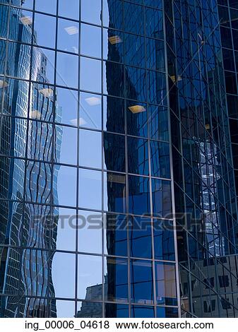 Reflection of skyscrapers on the glass of another building, Golden Square Mile, Montreal, Quebec, Canada View Large Photo Image Stock Photo - Reflection of skyscrapers on the glass of another building, Golden Square Mile, Montreal, Quebec, Canada. Fotosearch