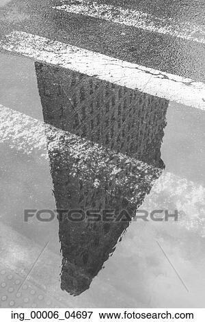 Stock Photo - Reflection of the Flatiron Building, Manhattan, New York City, New York State, USA. Fotosearch