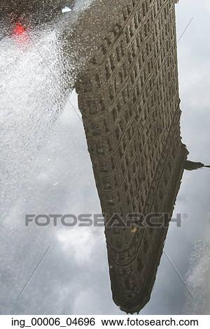 Reflection of the Flatiron Building, Manhattan, New York City, New York State, USA View Large Photo Image Stock Photograph - Reflection of the Flatiron Building, Manhattan, New York City, New York State, USA. Fotosearch