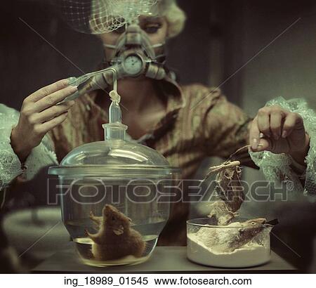 Retro chemist making a creepy experiment View Large Photo Image Stock Photography - Retro chemist making a creepy experiment. Fotosearch