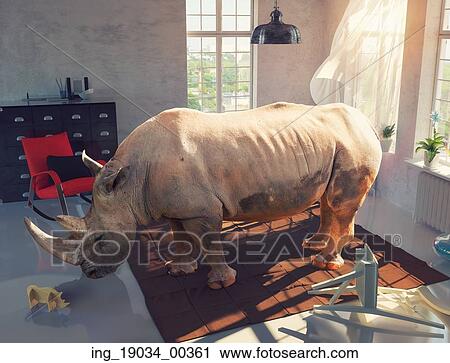Stock Image - rhinoceros in the room looking at the wooden toy. Photo combinated concept. Fotosearch