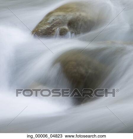 Stock Image - River flowing through rocks, Whistler, British Columbia, Canada. Fotosearch