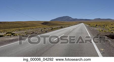 Stock Image - Road passing through landscape, Salar de Atacama, San Pedro de Atacama, El Loa Province, Antofagasta Region, Chile. Fotosearch