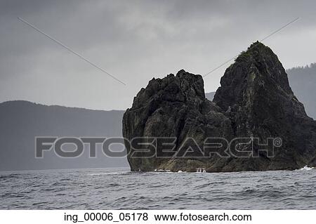 Rocky Island in the Pacific Ocean, Skeena-Queen Charlotte Regional District, Haida Gwaii, Graham Island, British Columbia, Canada View Large Photo Image Stock Photo - Rocky Island in the Pacific Ocean, Skeena-Queen Charlotte Regional District, Haida Gwaii, Graham Island, British Columbia, Canada. Fotosearch