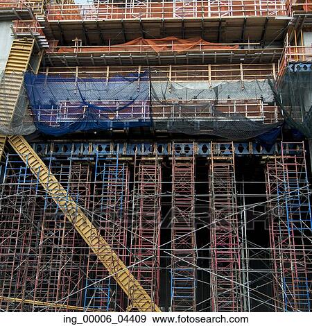 Scaffolding at construction site, Chelsea, Manhattan, New York City, New York State, USA View Large Photo Image Stock Photo - Scaffolding at construction site, Chelsea, Manhattan, New York City, New York State, USA. Fotosearch
