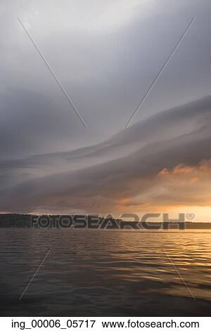 Scenic view of lake at dusk, Lake Of The Woods, Ontario, Canada View Large Photo Image Stock Photo - Scenic view of lake at dusk, Lake Of The Woods, Ontario, Canada. Fotosearch