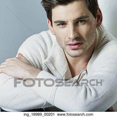 Stock Image - Serious look of handsome man. Fotosearch