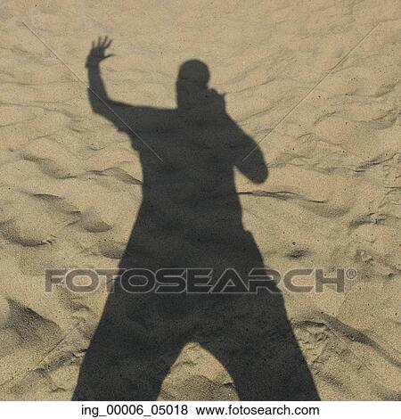 Shadow of a person on sand, Vina del Mar, Chile View Large Photo Image Stock Photo - Shadow of a person on sand, Vina del Mar, Chile. Fotosearch