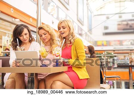 Short break during the shopping day View Large Photo Image Stock Photograph - Short break during the shopping day. Fotosearch