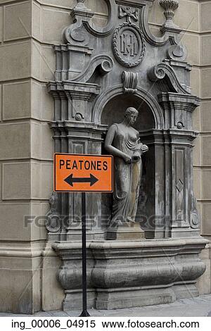 Sign in front of carving wall, Santiago, Santiago Metropolitan Region, Chile View Large Photo Image Stock Photography - Sign in front of carving wall, Santiago, Santiago Metropolitan Region, Chile. Fotosearch
