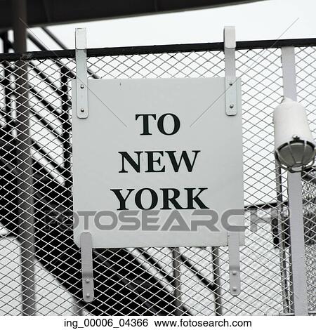 Sign on chainlink fence, Liberty Island, Manhattan, New York City, New York State, USA View Large Photo Image Stock Photograph - Sign on chainlink fence, Liberty Island, Manhattan, New York City, New York State, USA. Fotosearch