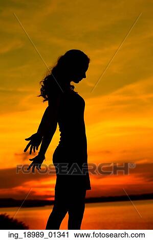 Silhouette of the beautiful young mother View Large Photo Image Stock Image - Silhouette of the beautiful young mother. Fotosearch
