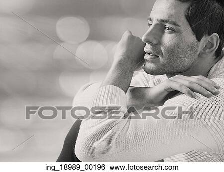 Stock Photograph - Smart attractive man in serious pose. Fotosearch