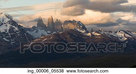 Stock Photo - Snow covered mountain range, Torres Del Paine National Park, Patagonia, Chile. Fotosearch