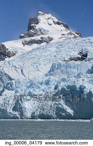 Snowy mountain at Lake Argentino, Los Glaciares National Park, Santa Cruz Province, Patagonia, Argentina View Large Photo Image Stock Photo - Snowy mountain at Lake Argentino, Los Glaciares National Park, Santa Cruz Province, Patagonia, Argentina. Fotosearch