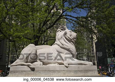 Stock Photo - Statue of lion at New York Public Library, Midtown, Manhattan, New York City, New York State, USA. Fotosearch