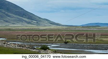 Stream flowing through landscape, Santa Cruz Province, Patagonia, Argentina View Large Photo Image Stock Image - Stream flowing through landscape, Santa Cruz Province, Patagonia, Argentina. Fotosearch