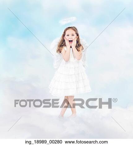 Surprised cheerful little girl among white clouds View Large Photo Image Stock Image - Surprised cheerful little girl among white clouds. Fotosearch