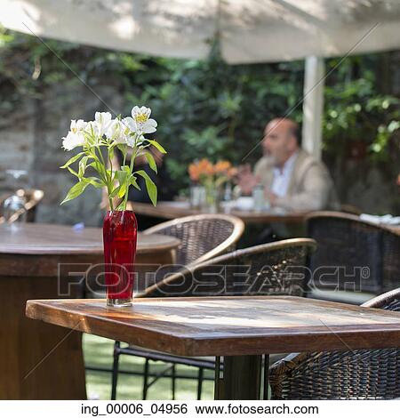 Table and chairs at outdoor restaurant, Santiago, Santiago Metropolitan Region, Chile View Large Photo Image Stock Photograph - Table and chairs at outdoor restaurant, Santiago, Santiago Metropolitan Region, Chile. Fotosearch