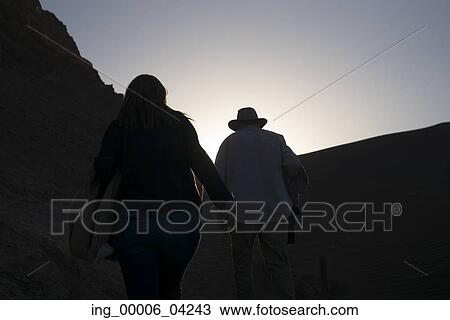 Tourists at Valle de la Luna, San Pedro de Atacama, El Loa Province, Antofagasta Region, Chile View Large Photo Image Stock Image - Tourists at Valle de la Luna, San Pedro de Atacama, El Loa Province, Antofagasta Region, Chile. Fotosearch