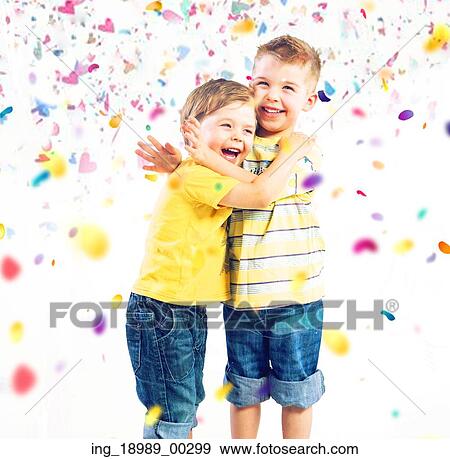Two little brothers enjoying colorful world View Large Photo Image Stock Photo - Two little brothers enjoying colorful world. Fotosearch