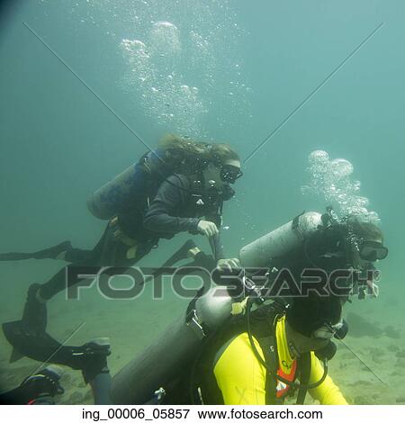 Underwater view of scuba divers, Ixtapa, Guerrero, Mexico View Large Photo Image Stock Photo - Underwater view of scuba divers, Ixtapa, Guerrero, Mexico. Fotosearch