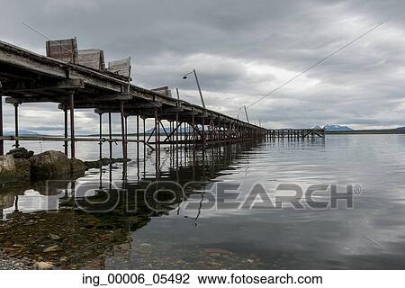 View of a pier at lake, Puerto Natales, Patagonia, Chile View Large Photo Image Stock Image - View of a pier at lake, Puerto Natales, Patagonia, Chile. Fotosearch