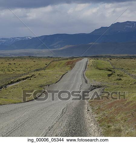 View of a road through landscape, Torres del Paine National Park, Patagonia, Chile View Large Photo Image Picture - View of a road through landscape, Torres del Paine National Park, Patagonia, Chile. Fotosearch