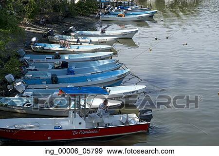 View of boats along shoreline, Ixtapa, Guerrero, Mexico View Large Photo Image Stock Photo - View of boats along shoreline, Ixtapa, Guerrero, Mexico. Fotosearch