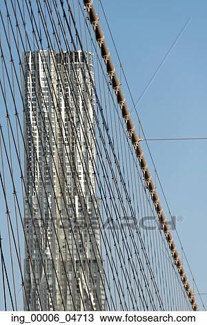 Stock Image - View of Brooklyn Bridge with skyscraper in the background, Manhattan, New York City, New York State, USA. Fotosearch