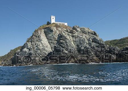 View of building on top of a cliff, Ixtapa, Guerrero, Mexico View Large Photo Image Stock Photo - View of building on top of a cliff, Ixtapa, Guerrero, Mexico. Fotosearch