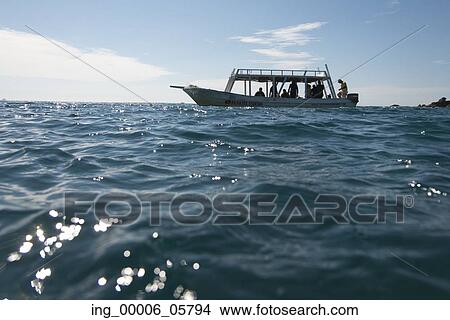 Picture - View of fishing boat at sea, Ixtapa, Guerrero, Mexico. Fotosearch