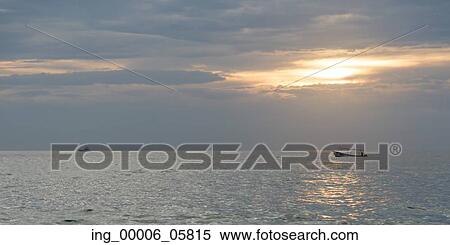 View of fishing boat on the ocean at sunset, Zihuatanejo, Guerrero, Mexico View Large Photo Image Stock Photography - View of fishing boat on the ocean at sunset, Zihuatanejo, Guerrero, Mexico. Fotosearch