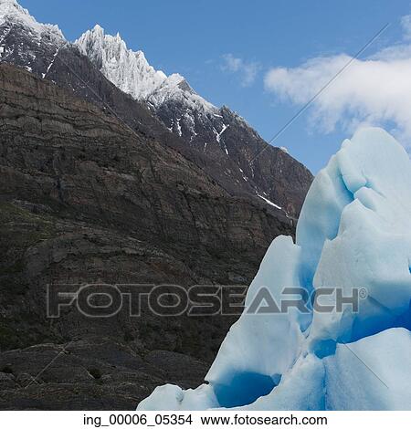View of iceberg with mountain, Grey Glacier, Grey Lake, Torres del Paine National Park, Patagonia, Chile View Large Photo Image Picture - View of iceberg with mountain, Grey Glacier, Grey Lake, Torres del Paine National Park, Patagonia, Chile. Fotosearch