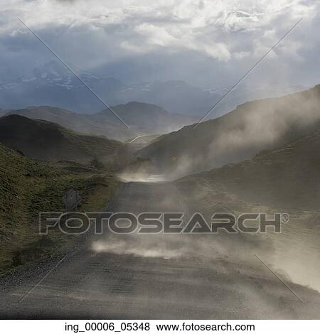 Stock Photo - View of road with mountains, Torres del Paine National Park, Patagonia, Chile. Fotosearch