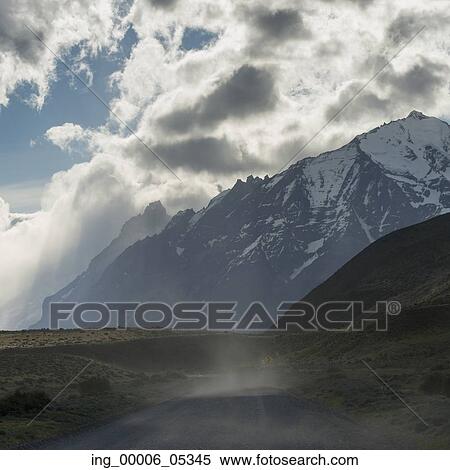 Stock Photography - View of road with mountains, Torres del Paine National Park, Patagonia, Chile. Fotosearch