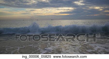 View of waves on the beach at dusk, Zihuatanejo, Guerrero, Mexico View Large Photo Image Stock Photography - View of waves on the beach at dusk, Zihuatanejo, Guerrero, Mexico. Fotosearch
