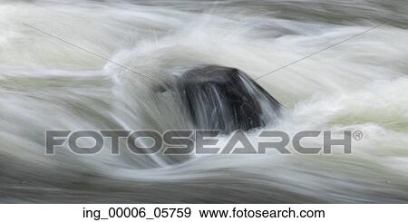 Water flowing through rocks, Rushing River Provincial Park, Ontario, Canada View Large Photo Image Stock Photo - Water flowing through rocks, Rushing River Provincial Park, Ontario, Canada. Fotosearch
