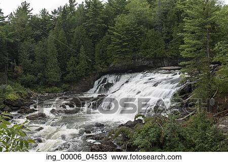 Stock Image - Waterfall in a forest, Plaisance Falls, Petite-Nation River, Quebec, Canada. Fotosearch