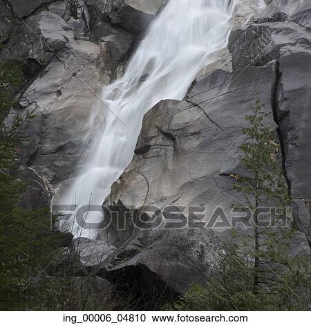 Stock Image - Waterfall through rocky terrain, Britannia Beach, Whistler, British Columbia, Canada. Fotosearch