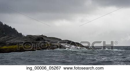 Stock Photo - Waves breaking on the coast, Skeena-Queen Charlotte Regional District, Haida Gwaii, Graham Island, British Columbia, Canada. Fotosearch