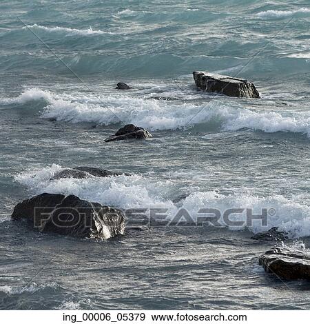 Stock Photo - Waves on the beach, Lake Pehoe, Torres del Paine National Park, Patagonia, Chile. Fotosearch