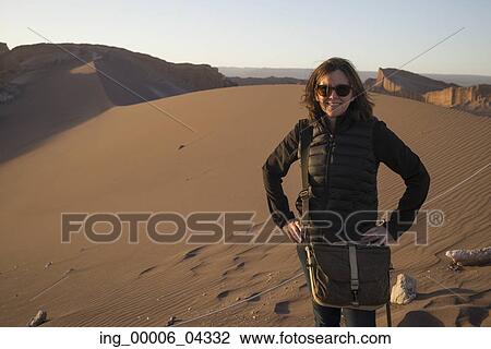 Woman in desert, Valle de la Luna, San Pedro de Atacama, El Loa Province, Antofagasta Region, Chile View Large Photo Image Stock Image - Woman in desert, Valle de la Luna, San Pedro de Atacama, El Loa Province, Antofagasta Region, Chile. Fotosearch